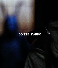 a black and white photo with the words donnie darko on it