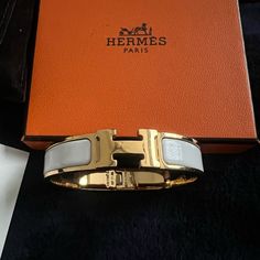 Hermes Luxury White Authentic Clic H Bracelet Blanc Color Bangle Comes With Dust Bag, Box And Bag Used Very Few Times In Excellent Condition Size Pm Hermes Jewelry, White Bracelets, Womens Jewelry Bracelets, Dust Bag, Bangles, Women Jewelry, White, Color