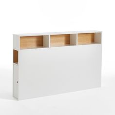 a white book shelf with three wooden shelves