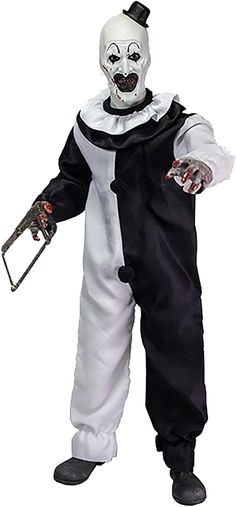 a person in a clown costume holding a knife