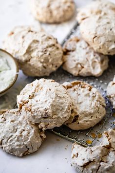 several cookies are cooling on a wire rack