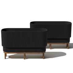 two black chairs sitting next to each other