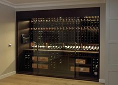 the wine cellar is full of many bottles