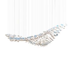 a white and blue chandelier hanging from the ceiling in front of a white wall