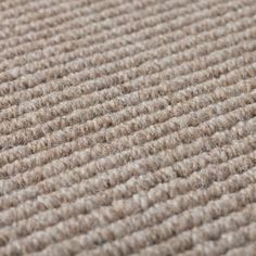 a close up view of the texture of a carpet with no pattern or color on it