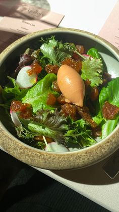 a salad in a bowl on a table