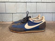 --  Vintage 1980s Nike Oceania Dark Blue Sneakers  --  Good overall condition with some wear and staining --  Made in Taiwan --  Dated 1981 --  Stamped size 9.5 --  Soles are very stiff --  Sold as is and for display only --  Size Men's size 9 1/2, but please see below for exact measurements --  Thanks for looking and be sure to check out my other items! MEASUREMENTS Height (From Top to Bottom of Heel) - 4 1/8 inches Width (At Widest Point) - 3  7/8 inches Length (From Toe to Back of Boot) - 11 Vintage Blue Sneakers With Rubber Waffle Outsoles, Vintage Nike Blue Sneakers, Dark Blue Sneakers, Nike Dunk Low Vintage Navy, Nike Cortez Blue, Nike Blue Synthetic Sneakers, Womens Wedding Shoes, Crib Shoes, Blue Sneakers