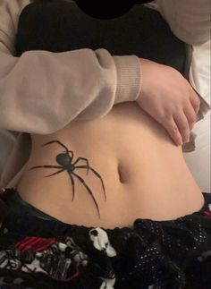 spider tattoo hip placement