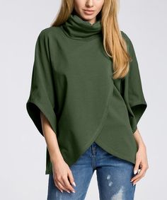 Fall Tops With Asymmetrical Hem, Oversized Tops With Asymmetrical Hem For Fall, Solid Color Fall Tops With Asymmetrical Hem, Casual Green Wrap Top, Asymmetrical Tops For Fall Layering, Asymmetrical Tops For Layering In Fall, Fitted Green Funnel Neck Top, Green Stretch Asymmetrical Top, Green Asymmetrical Stretch Top