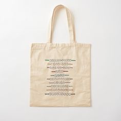 a tote bag with an embroidered design on it