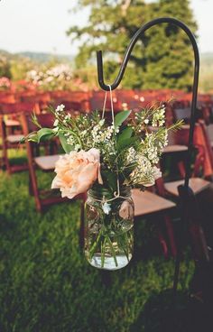 a vase filled with flowers sitting on top of a table