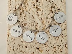 Necklace hand stamped Metal stamp necklace on an approx. 20mm, 3/4 inch round disk Stainless Steel Choose your letters to be filled with black ink or natural 20" chain Personalize your necklace  Add your special date Initials,  add & or ♥️ different symbols to choose from Perfect gifts for anniversary, birthdays, Valentines, Mothers day Metal Stamped Necklace, Stamp Necklace, Date Necklace, Gifts For Anniversary, Jewelry Stamping, Different Symbols, Hand Stamped Metal, Stamped Necklaces, Metal Stamped Jewelry