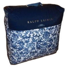 a blue and white tote bag with the name raphael lauren on it's side