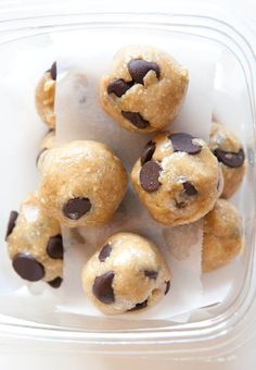 chocolate chip cookie doughnuts in a plastic container