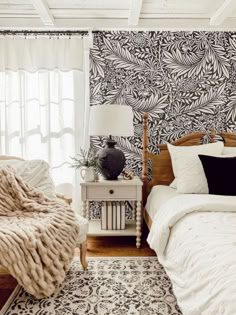 a black and white floral pattern wallpaper in bedroom Black White Floral Wallpaper, Wallpaper In Bedroom, White Floral Wallpaper, Bedroom Wallpapers, Branches Wallpaper, Lake Property, Guest Bedroom Makeover, Monochrome Decor, Interior Murals