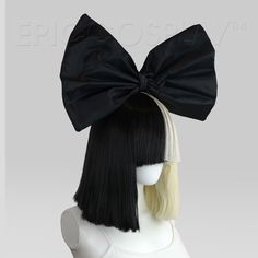 The Official Sia Wig! Includes the iconic black bow-tie! Introducing The Only Licensed Sia Wig For Men & Women By Epic Cosplay Wigs! This official wig is designed by Sia and is the same version she would wear on the stage with the over-the-top bow to match! Now you don’t have to put up with all those cheaply-made cosplay wigs anymore, since we are here to offer you the true Sia experience! Our 2-color party wig is made from premium materials, so you can rest assured that it can endure the ab Sia Halloween Costume, Sia Wig, Sia Costume, Which Character Are You, Party Wig, Cheap Wigs, Color Party, Epic Cosplay, Short Bangs