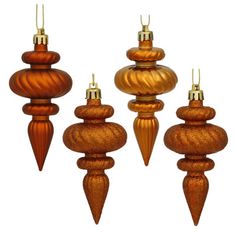 an assortment of wooden ornaments hanging from strings