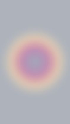 an image of a circular object in the sky with pink and purple colors on it