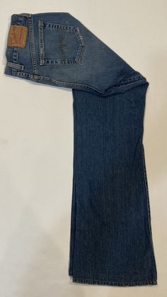 Up for Auction: Authentic Lucky Brand Denim Blue Jeans. These Jeans are New without tag (see photos, they do have a few wrinkles that could be ironed). Each pair of jeans is unique. Each pair individually goes through a washing/distressing process so that no two pairs are alike. These jeans feature heavy vintage washing, and scarring to give them the look and feel you love. Description: Lucky Brand Blue Jeans. The blue jeans have a mid rise, featuring classic 5-pocket styling See pics. Features: Sweet N Low, Scarring, Denim Blue, Stretch Jeans, Bell Bottom Jeans, Lucky Brand, Blue Jeans, Wrinkles, Blue Denim