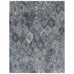 an area rug with blue and white designs on the front, along with a gray background