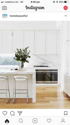 the instagram page shows an image of a kitchen with white cabinets and counter tops