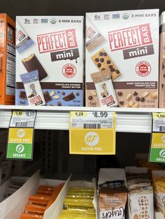 boxes of mini chocolate bars on display in a store