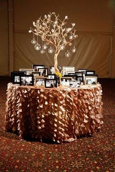 a family reunion table with pictures and a tree