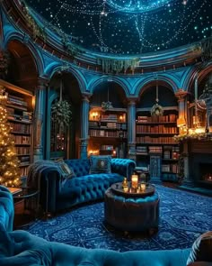 a living room filled with blue couches and bookshelves covered in christmas lights