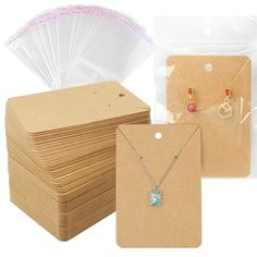 the package includes several items such as necklaces, earrings and pendants with clear plastic bags