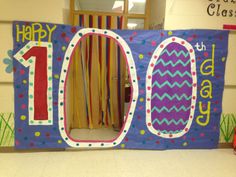 a classroom door decorated to look like it has the number one on it and is in front of an open doorway