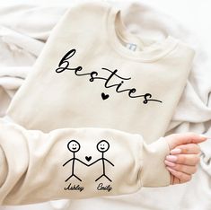 Personalized Besties Hoodie with Name on Sleeve For Best Friends, Matching Besties Trip Crewneck, Cute Birthday Gift For Friend,Gift For Her,  990 -If you would like any other color of t-shirt, sweatshirt, hoodie, etc., please let me know by sending a message. I will provide it for you. ----------- How to Order Your Custom Design T-shirt ---------- * Choose your t-shirt color * Choose your size * PLEASE make sure all your order's steps Unisex Soft-Style T-shirt The unisex soft-style t-shirt puts Custom Gifts For Friends, Bff Hoodies For 2, Twining Outfits Best Friends, Hoodies For Best Friends, Matching Clothes For Best Friends, Matching Hoodies For Best Friends, Thoughtful Gifts For Best Friends, Bestie Hoodies, Cool Hoodies Designs