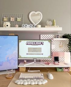 a desktop computer sitting on top of a wooden desk next to a keyboard and mouse