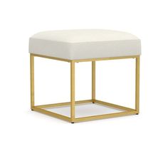 a gold and white stool with a square foot rest on the bottom, in front of a white background