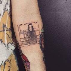 a person with a tattoo on their arm