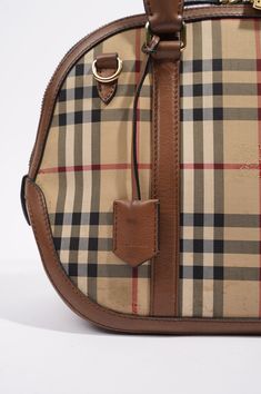 Brand: Burberry Style: Horseferry Bowling Bag Size: One Size Width: 38cm Height: 24.5cm Depth: 12cm Handle Drop: 15cm Exterior Condition: New - Vintage Interior Condition: New Exterior Colour: Check / Tan Interior Colour: Black / Tan Hardware Colour: Gold Serial Code: ITGRUFRA2CAS Manufactured In: Italy Comes With: Original Tags, Clochette, Padlock, Keys & Dustbag Delivery 5-8 or 10-15 working days Please note that during high season and Sale period, delivery times may be affected We accept payment with a Credit card, Debit card, or PayPal.Note: Our Items are totally New High quality Brand Inspired Refurbished. Please make sure you are well aware of it before buying any of the Item.T&C's Apply in case of refunds. Please send us message on below chat to confirm availability. We will send th Burberry Style, Interior Colour, Bowling Bag, Bowling Bags, Vintage Interior, Backpack Tote Bag, Burberry Bag, Exterior Colors, Black Tan