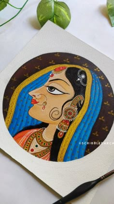 a painting of a woman with blue hair and gold jewelry on it's face