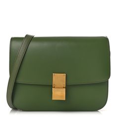 This is an authentic CELINE Box Calfskin Classic Box Medium Flap Bag in Army Green. This super-chic shoulder bag is crafted of fine smooth leather in dark green. The handbag features a long leather shoulder strap and a frontal matte gold press lock that opens the frontal flap to a partitioned matte green leather interior with zipper and patch pockets. Celine Box Bag, Oval Bag, Celine Box, Matte Green, Green Leather, Flap Bag, Matte Gold, Leather Interior, Belt Bag