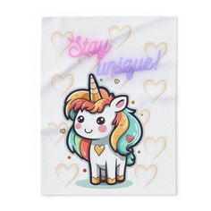 a unicorn sticker with the words stay unique on it's back and hearts in the background