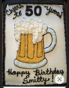 a birthday cake with a mug of beer on it and the words happy 50th written in white frosting