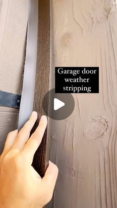 someone using a garage door weather striping tool