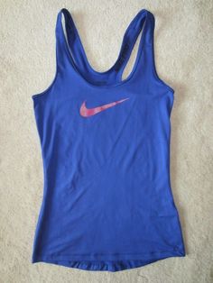 NIKE SPORTS TANK TOP THAT IS SLIMMING AND LOOKS GREAT ON. GREAT FIT AND STYLE. Casual Breathable Blue Tops, Casual Blue Breathable Tops, Nike Blue Casual Activewear, Comfortable Blue Activewear For Gym, Functional Blue Cotton Activewear, Nike Blue Cotton Activewear, Blue Casual Training Activewear, Blue Casual Activewear For Training, Blue Casual Activewear With Athletic Fit