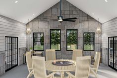 a rendering of a dining room with chairs and a fire pit