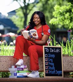 a woman sitting on a bench reading a book next to a sign that says do list