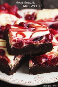 some brownies with white chocolate and cherries on them