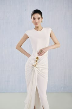 Crafted from viscose, the round neck and above the knee length create a versatile yet elegant silhouette. This dress is perfect for any occasion, adding a touch of luxury to your wardrobe. Magda Butrym Dresses, White Sarong, Above The Knee Dress, Sarong Dress, Mean Blvd, Rose Brooch, Slim Fit Dress, Magda Butrym, Designer Drapes