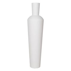 a tall white vase sitting on top of a table