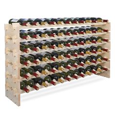 a wooden wine rack filled with lots of bottles on top of eachother in front of a white background