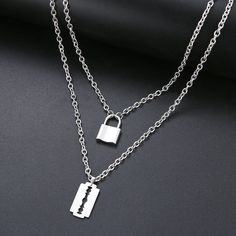 Titanium Double Layer Lock and Blade Pendant Necklace - Premium Necklace from Dazzling Delights - Just $25.50! Shop now at Dazzling Delights Circle Necklaces, Blade Necklace, Titanium Metal, Layered Chain, Titanium Jewelry, Lock Necklace, Picture Gifts, Necklace Shop, Layered Chains