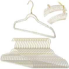 PRICES MAY VARY. Elegant Acrylic Design: our clear glitter acrylic hangers feature a simple yet sophisticated design with solid color hooks, which are a must have for most women and girls who want their wardrobe to look elegant and classy Organize Your Wardrobe: these glitter hangers are designed with non slip notches and wide hooks, which can be applied to help you store dresses, skirts, pants, jeans, shirts, sweaters, coats, etc., keeping your wardrobe tidy as well as saving you a lot of space Acrylic Hangers, Hangers For Clothes, Gold Coat, Glitter Outfit, Space Saving Hangers, Suit Hangers, Ideal Shape, Product Showcase, Coat Hangers