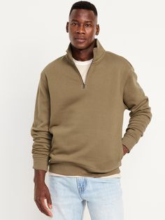 mock neck long sleeves on-seam pockets rib-knit trim pull-over style oversized fit hits below waist model is approx.  6'1" and wears size mmachine wash according to the care instruction label